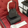 STUDDED DRAWSTRING BUCKET BAG 20 IN BLACK RE-NYLON MIX CALFSKIN