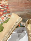 GG CROSS STRAP FLAT SHOES IN BEIGE CALFSKIN WITH STRAW SOLE