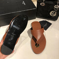 FLAT THONG IN BRONZE BROWN CALFSKIN