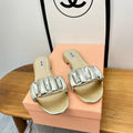 FLAT SLIDE IN LIGHT GOLD CALFSKIN