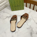 INTERLOCKING G SLIDE SANDAL IN BROWN BEIGE CALFSKIN