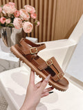FLAT SANDALS IN RUST BROWN TRIOMPHE EMBOSSED SMOOTH CALFSKIN