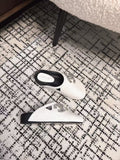 FLAT MULES IN WHITE CALFSKIN