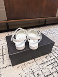 FLAT SLINGBACKS IN WHITE CALFSKIN AND BLACK FABRIC