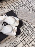 FLAT SLINGBACKS IN WHITE CALFSKIN AND BLACK FABRIC